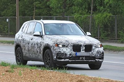 2019-bmw-x5-spied-prototype-reveals-new-angular-design-front-air-intakes-119686_1.jpg